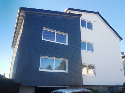 Fassadensanierung mit Holzwolledämmplatten und Teilweiser verschieferung 30x 20
